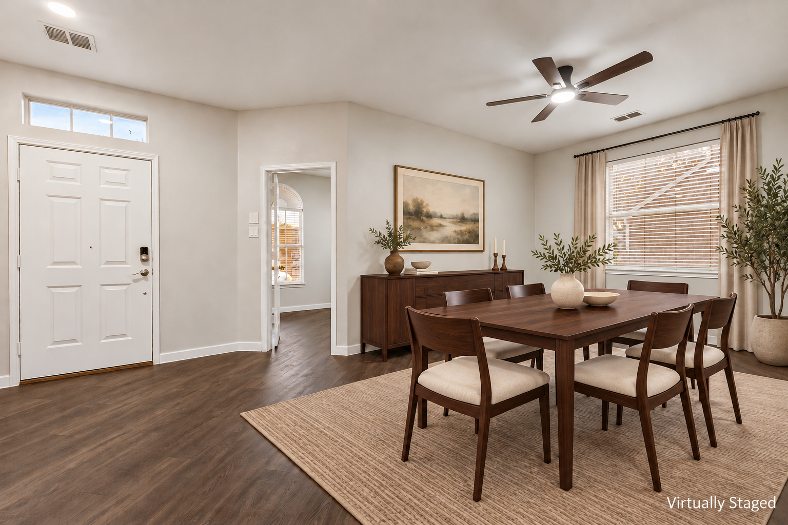 Virtually staged view of the formal dining room near the front entry at 4215 Maidstone Drive.
